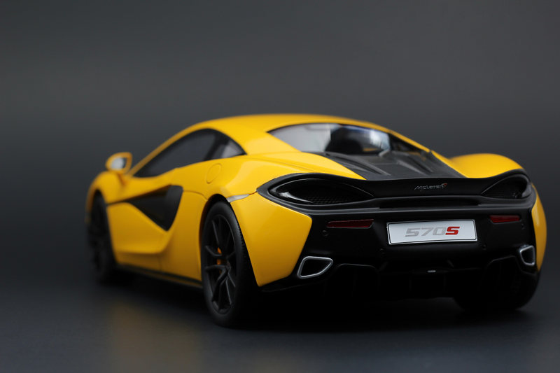 Illustration for article titled TopSpeed's Volcano Yellow McLaren 570s